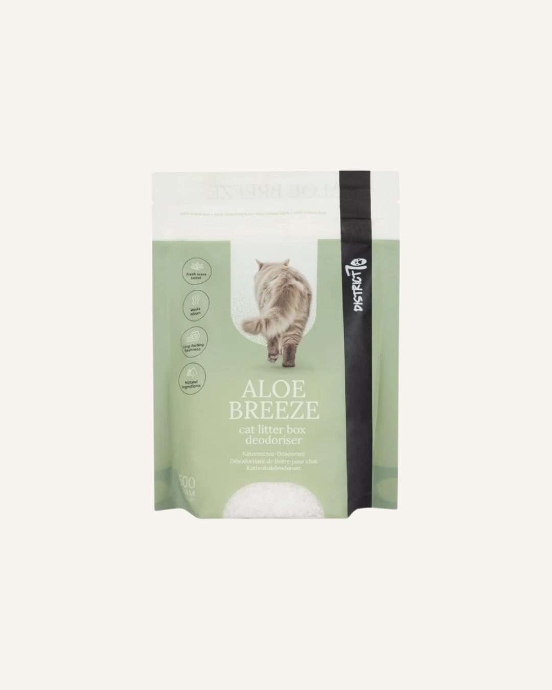 Green and white resealable pouch of District 70 Aloe Breeze cat litter deodorizer, 500g, with cat illustration on front.