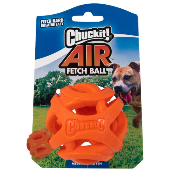 Orange Chuckit Air Fetch Ball with hollow, flexible design on blue and green packaging with dog photo.