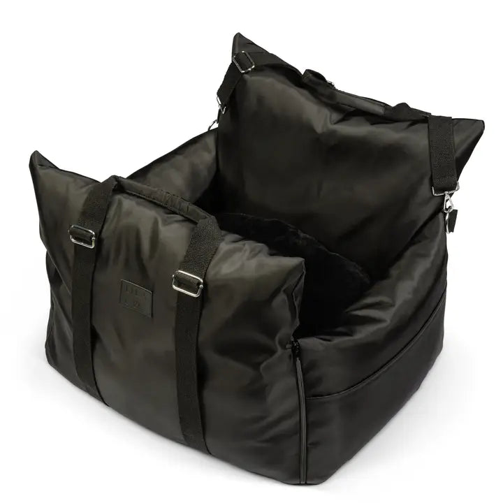 Black premium pet car seat with padded sides and adjustable straps for safety.