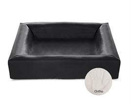 Black orthopaedic dog bed with raised cushioned edges and smooth fabric finish, medium size.