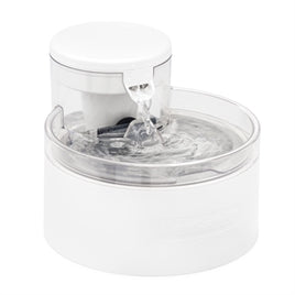 White PetSafe Drinkfontein Outlast water fountain with clear water reservoir and flowing water feature.
